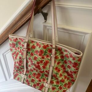 Delightful Dooney and Bourke tote bag with poppy flower design.